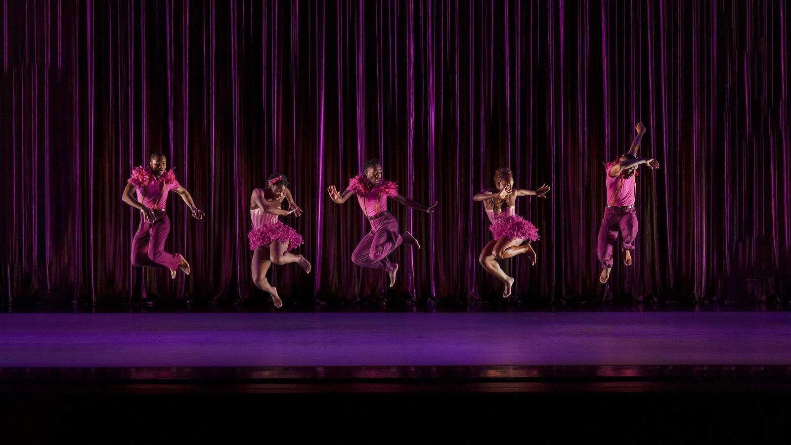 Members of the Company all mid jump in CENTURY