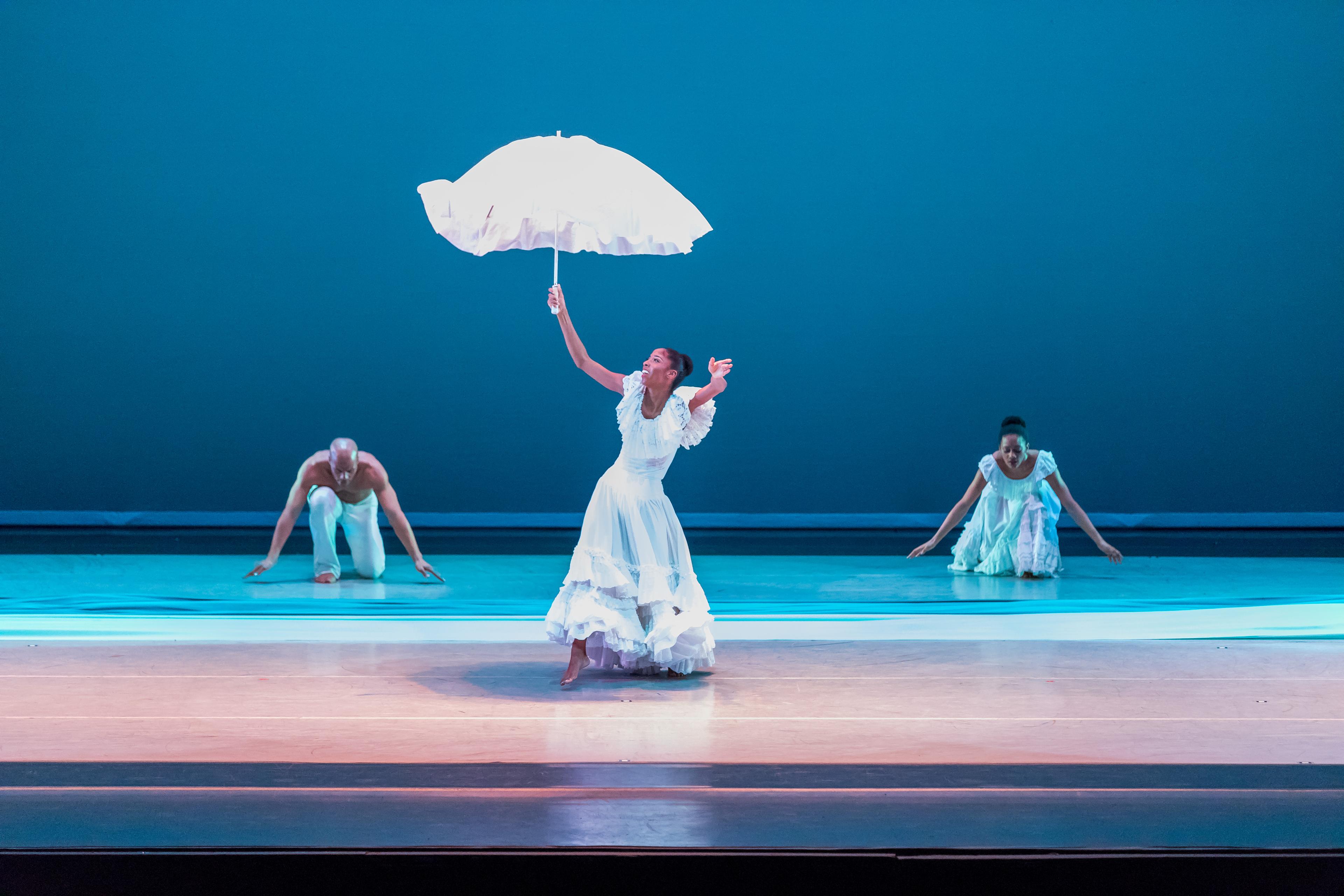 Three dancers in white. 