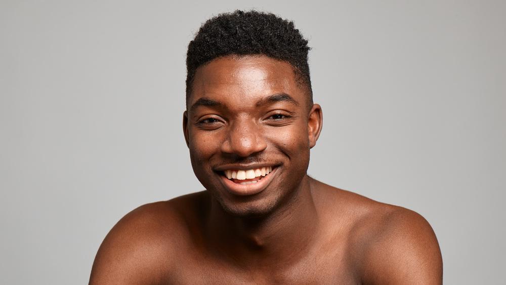 A headshot of Isaiah Day