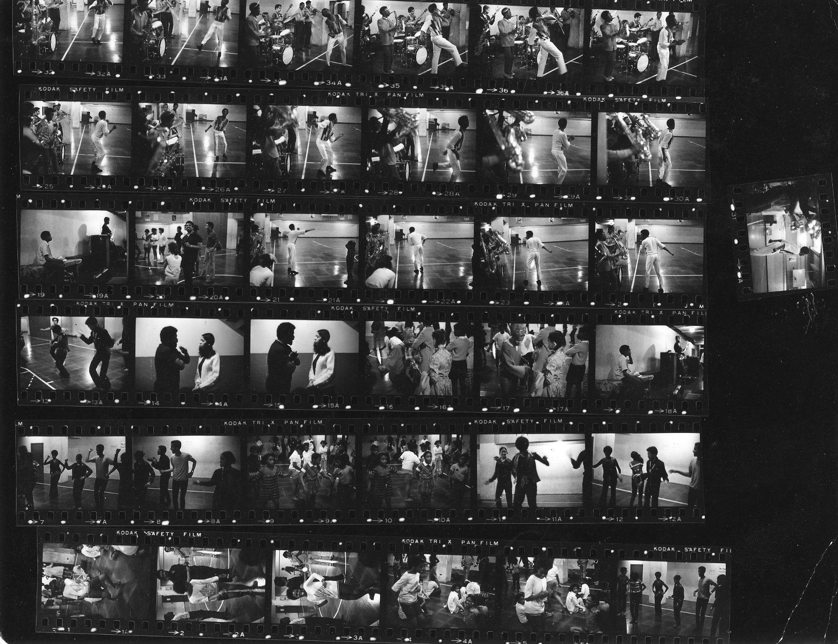 A thumbnail strip of black and white images