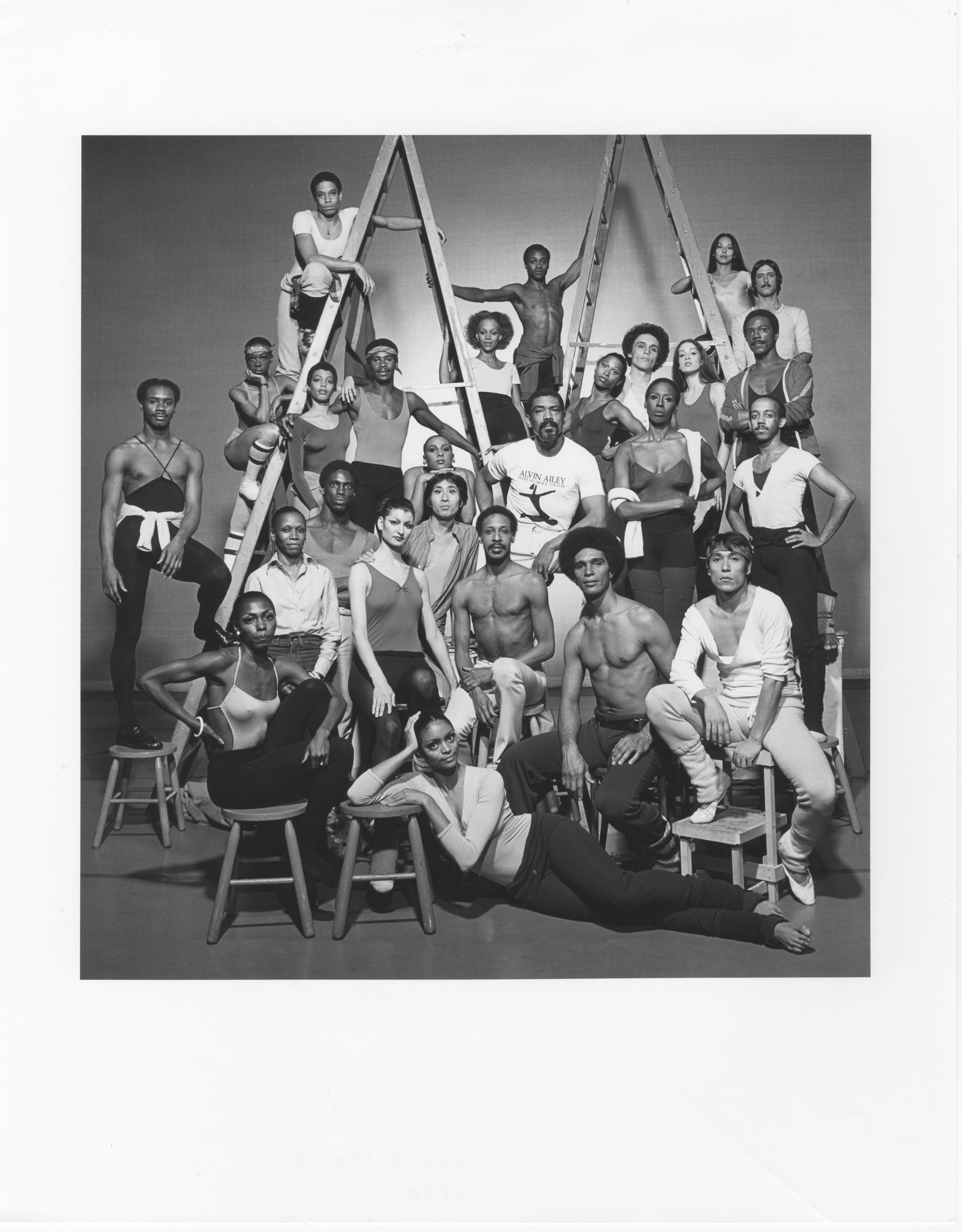 A black and white photo of a dance troupe.