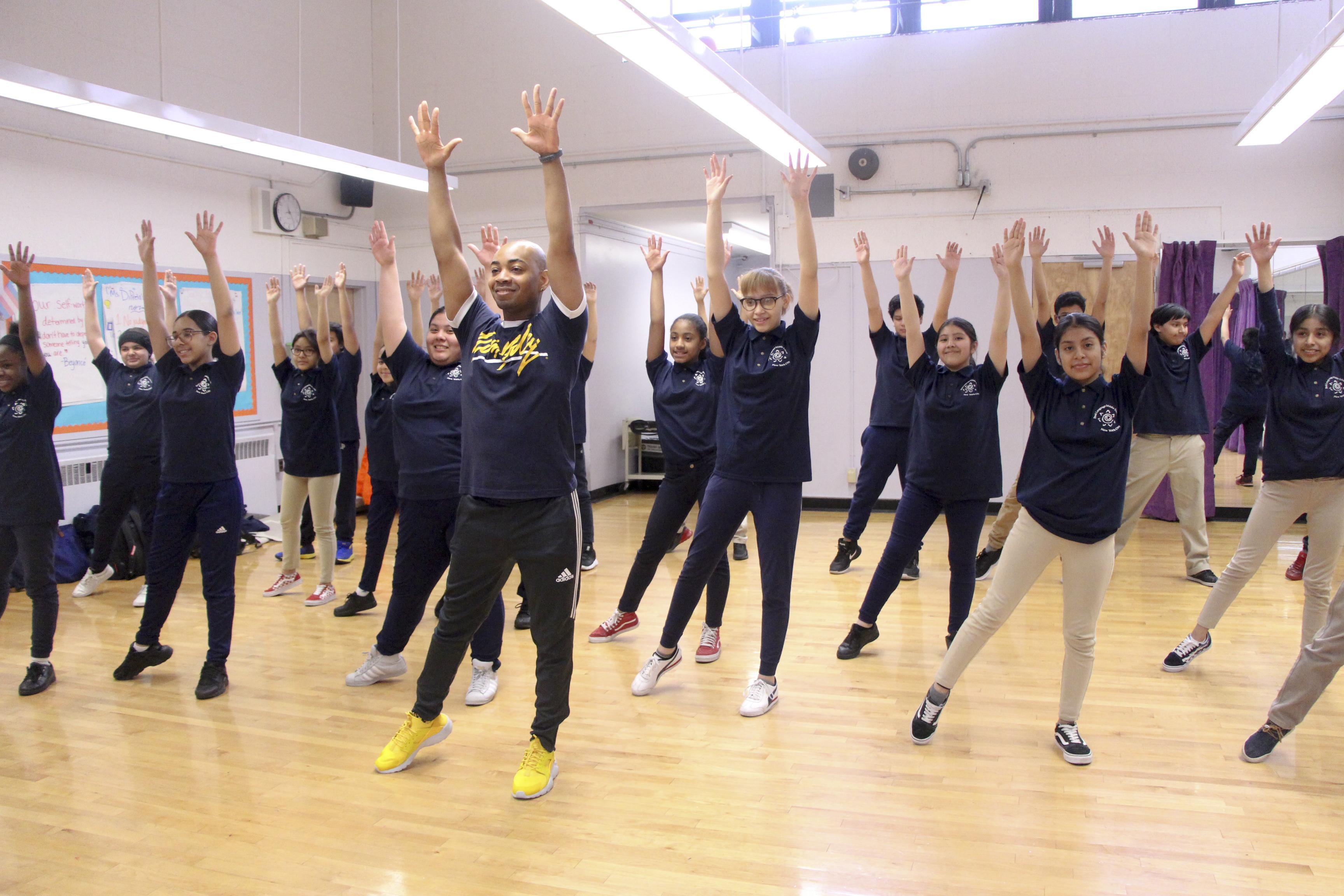 AIE Teaching Artist Cedric Green leads AileyDance Kids at Dual Language MS