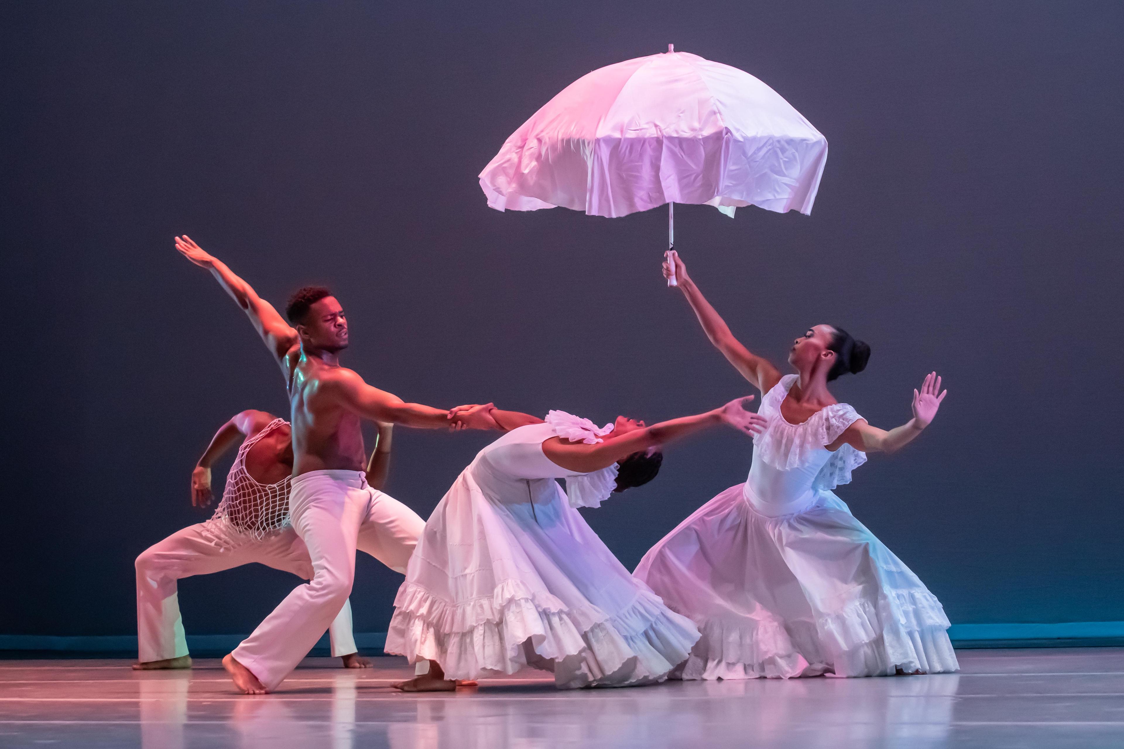 Alvin Ailey American Dance Theater's Solomon Dumas Samantha Figgins and Constance Stamatiou in Alvin Aileys Revelations. Photo by Glyn Stanley.