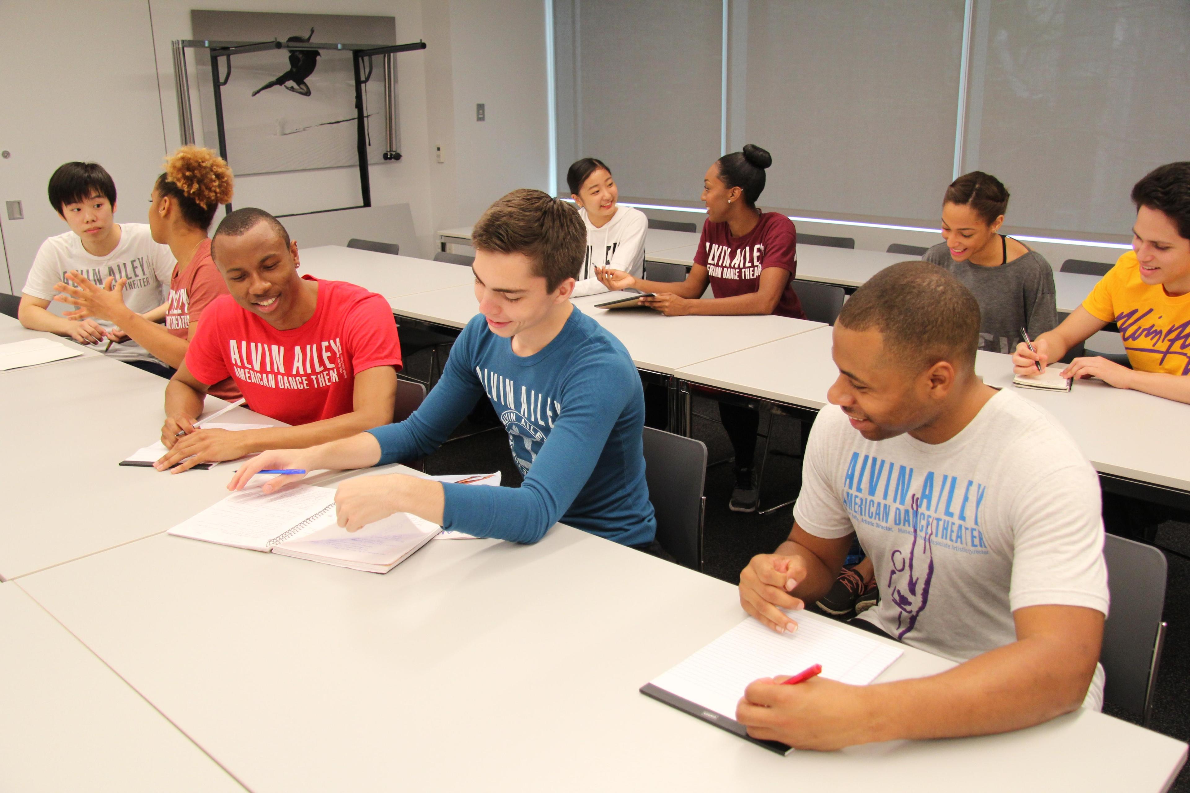 Students sitting in a classroom at the Ailey Studios